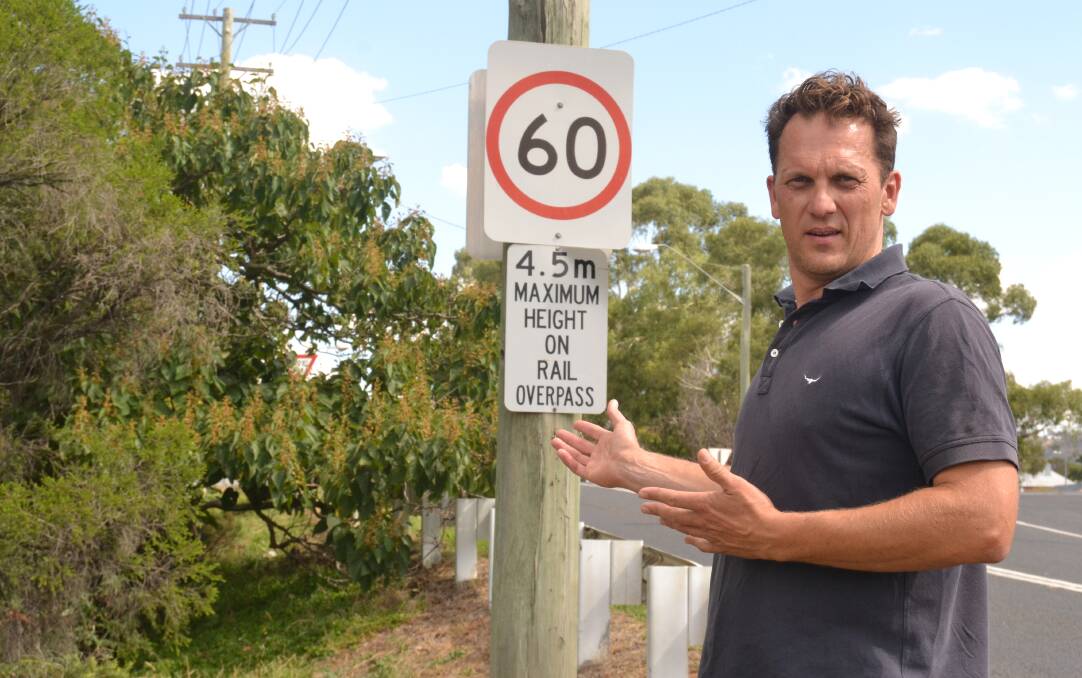 PROBLEMATIC: Councillor Jess Jennings says trees are affecting visibility at the
intersection of Rocket Street and Vale Road, causing people to miss the give way sign.