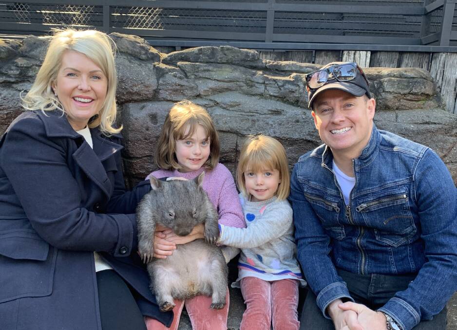 FAMILY: Chezzi and Grant Denyer with their daughters Sailor, 9, and Scout, 4, during a recent visit to the Australian Reptile Park. Photo: SUPPLIED