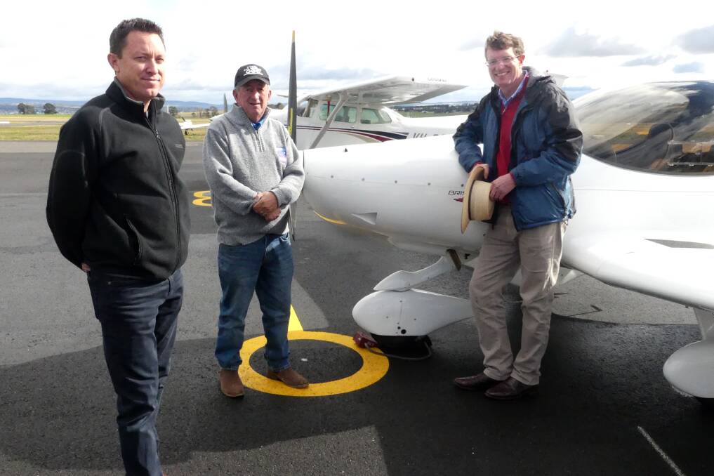 SKY'S THE LIMIT: Central West Flying general manager Ben Surawski, mayor Bobby Bourke and Member for Calare Andrew Gee.