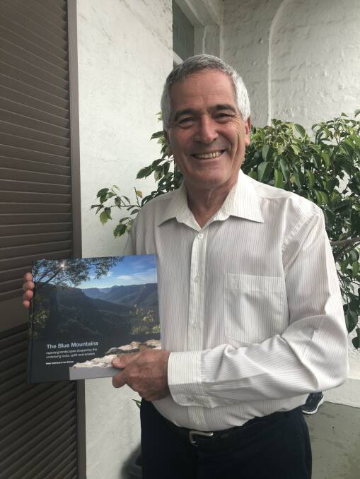 NEW CHAPTER: Author and geophysicist Peter Hatherly with his new book on the landscapes of the Blue Mountains.