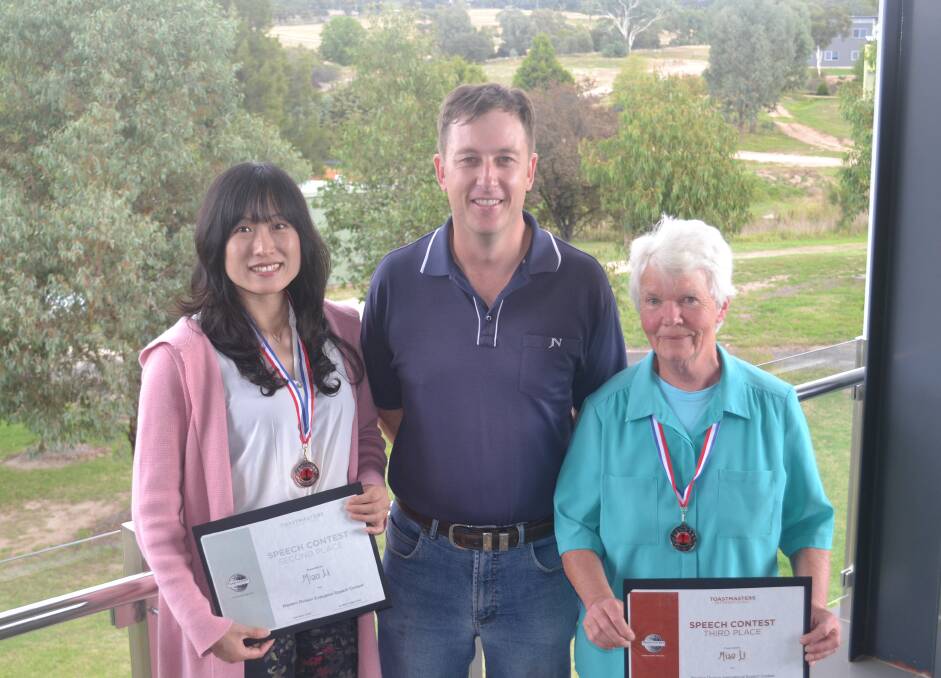 SUCCESS: Miao Li and Sheila Riordan, who were placegetters at the Western Division NSW Toastmasters Competition, with Brad McWilliams.