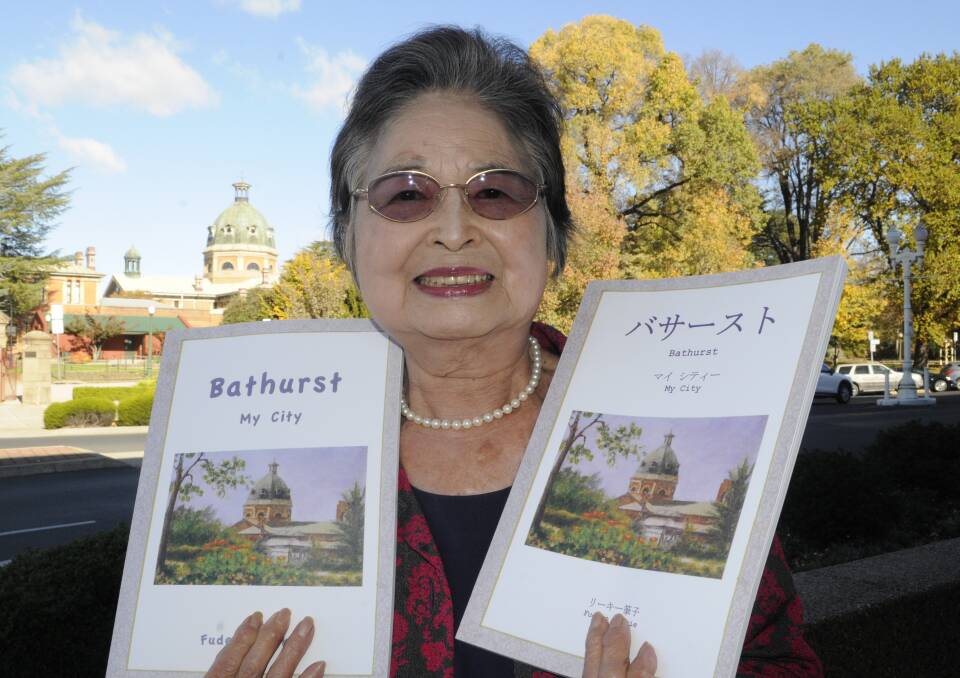 AUTHOR, AUTHOR: Fudeko Reekie, pictured with her 2016 book Bathurst – My City, has a new book coming out. Photo: CHRIS SEABROOK 052416cfudeko