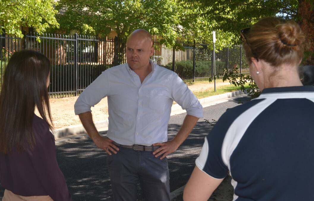 COMMITMENT: Beau Riley, the Labor candidate for the seat of Bathurst, talks to the media outside Eglinton Public on Monday. 