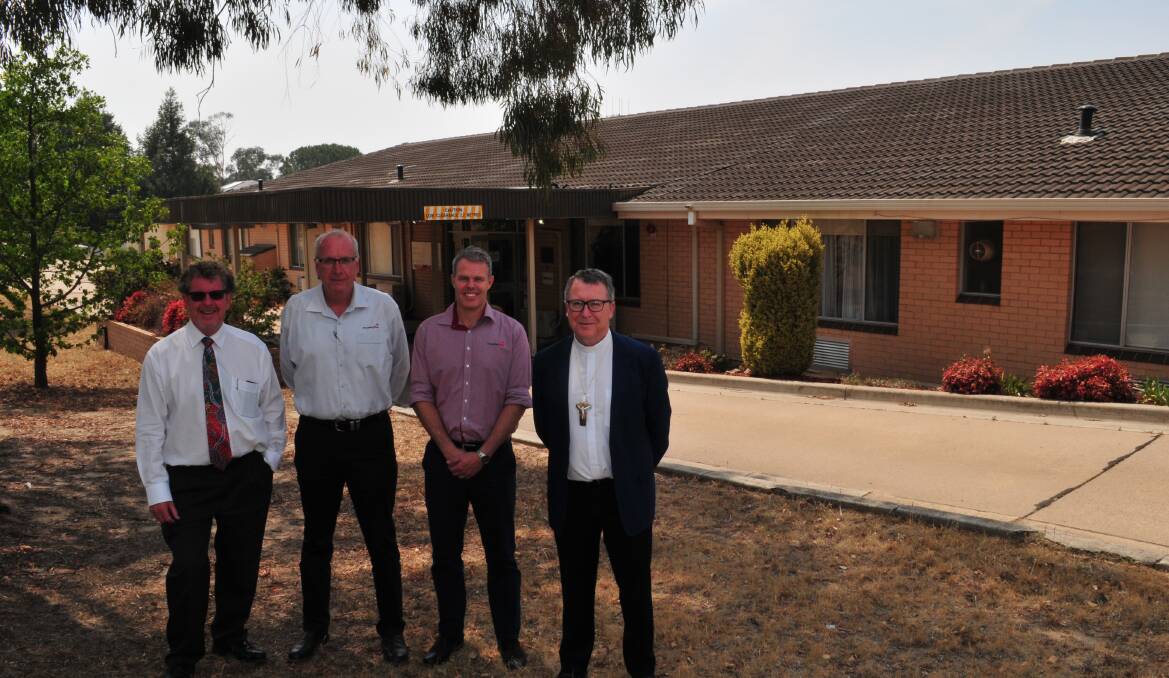 PLAN: Father Paul Devitt, Gary Wright and Justin Cantelo from Housing Plus and Catholic Bishop of Bathurst Michael McKenna outside the former Opal Aged Care facility, which will be used for emergency accommodation.