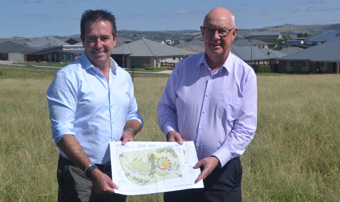 ON SITE: State Member for Bathurst Paul Toole and mayor Graeme Hanger with a plan for Freeman Park on Freeman Circuit in Llanarth. 020419freeman