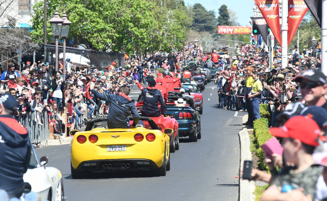 CROWDED: Bathurst 1000 drivers are greeted by fans during the driver and transporter parade on Wednesday. But can the parade be improved? Photo: CHRIS SEABROOK