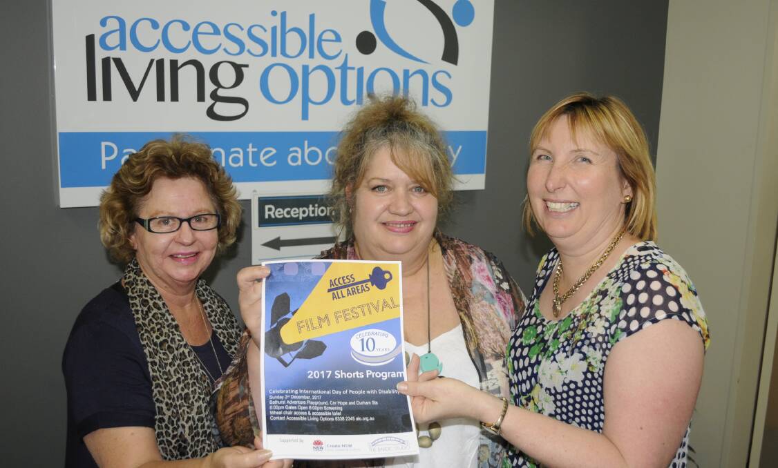 LIGHTS, CAMERA: Cheryl Keogh, Michelle Graves and Kath Parnell from Accessible Living Options are ready for a film festival this Sunday. Photo: CHRIS SEABROOK 112817cflmfest1
