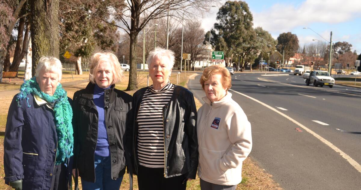 LOCATION, LOCATION: Councillor Monica Morse (second from right) with Nona Fisher, Judy Upfold and Patricia Gannon, who want Australia Wide Coaches to move its pick-up and drop-off locations from the visitor centre. 072017coach
