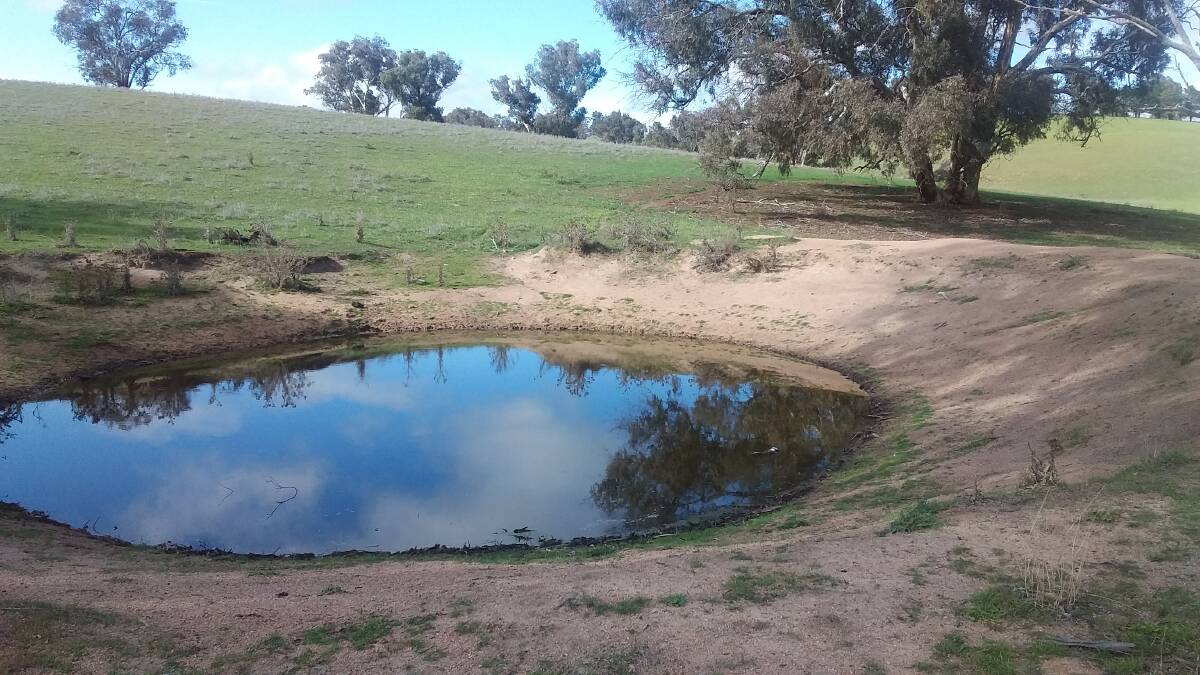 GOING DOWN: A near empty dam near Bathurst is still waiting for drought-breaking rains.