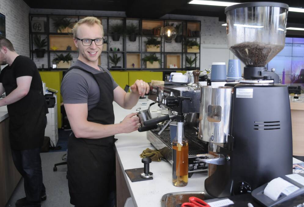BEAN THERE: Barista Jack Hockings, pictured at work at Gunthers Lane, has been nominated for a small business award. Photo: CHRIS SEABROOK 120516cgunthrs1