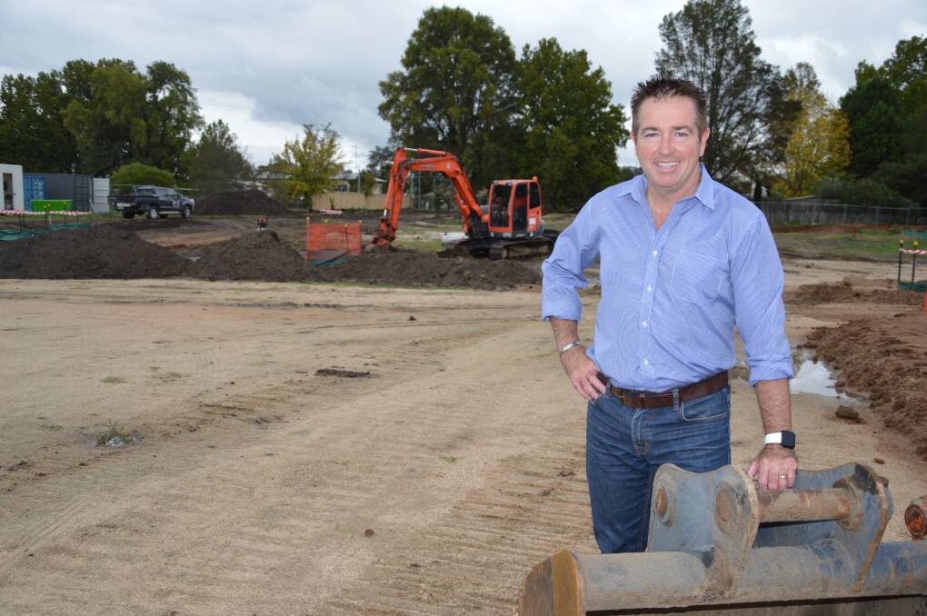 SITE SEEING: Member for Bathurst Paul Toole at a construction site where work is continuing.