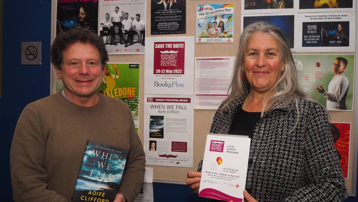Bathurst Memorial Entertainment Centre manager Stephen Champion and Bathurst Writers' and Readers' Festival co-ordinator Jen Barry back in 2022, when Aoife Clifford's novel When We Fall was the Great Festival Read. Photo: SAM BOLT