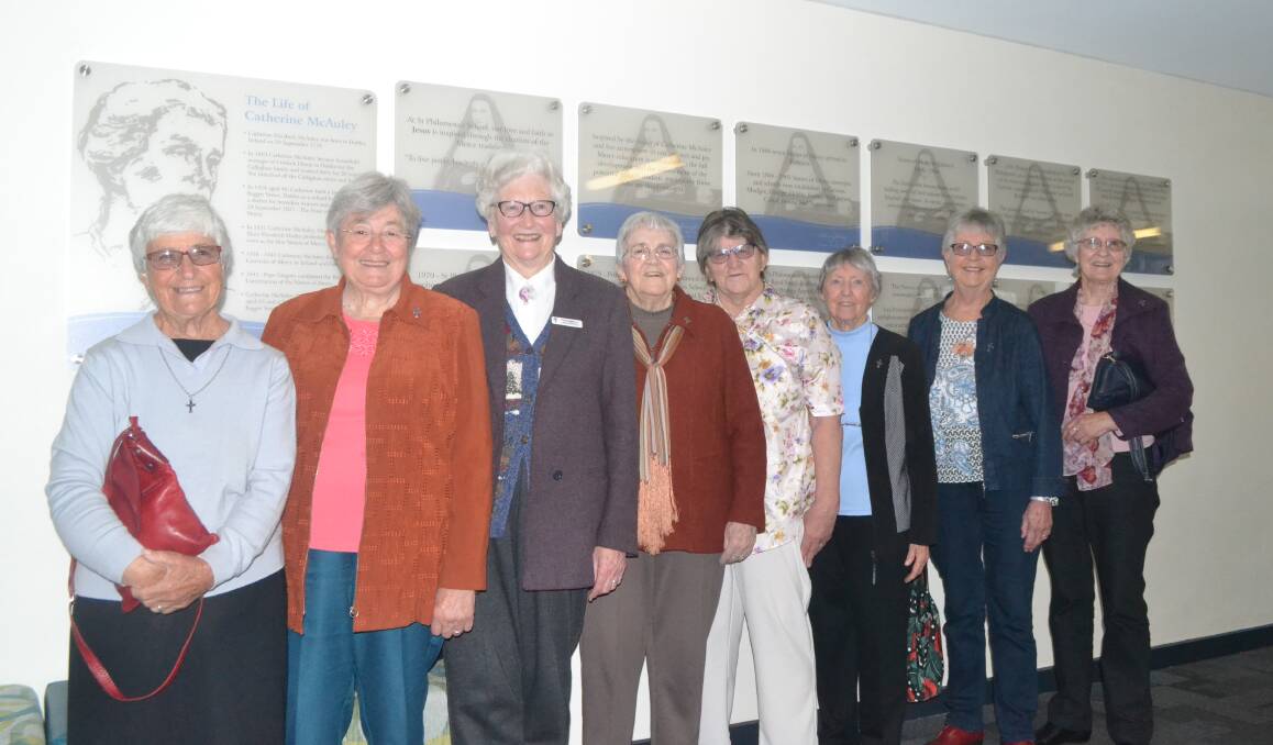 PAST AND PRESENT: Local Sisters of Mercy were at St Philomena's School to see the unveiling of a wall display that tells the religious group's story. 092718sisters