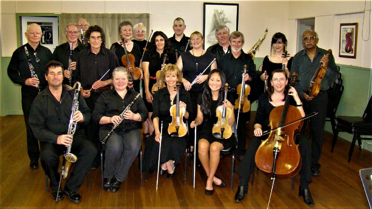 FLASHBACK: Gustaw (fourth from left, back row) with a Mitchell Conservatorium orchestra in Lithgow in 2011.