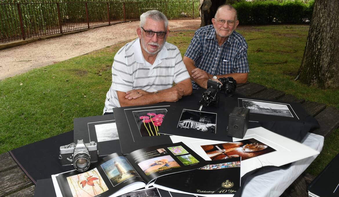 TAKE A PICTURE: Bathurst Camera Club members Robert Parkes and Alan McMillen are looking forward to the club's 40th anniversary celebrations. Photo: CHRIS SEABROOK
