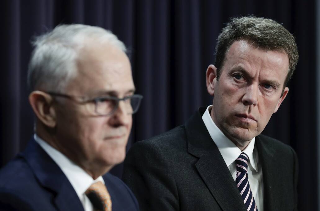 NEXT STEP: Prime Minister Malcolm Turnbull and Social Services Minister Dan Tehan talk about the government's response to the Royal Commission into Institutional Responses to Child Sexual Abuse. Photo: ALEX ELLINGHAUSEN