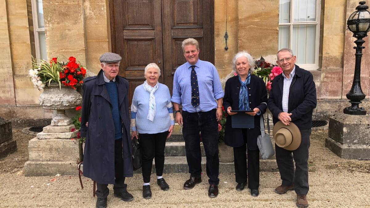 SPECIAL TREATMENT: The Russells with Earl Bathurst during their visit to the Cotswolds town of Cirencester.