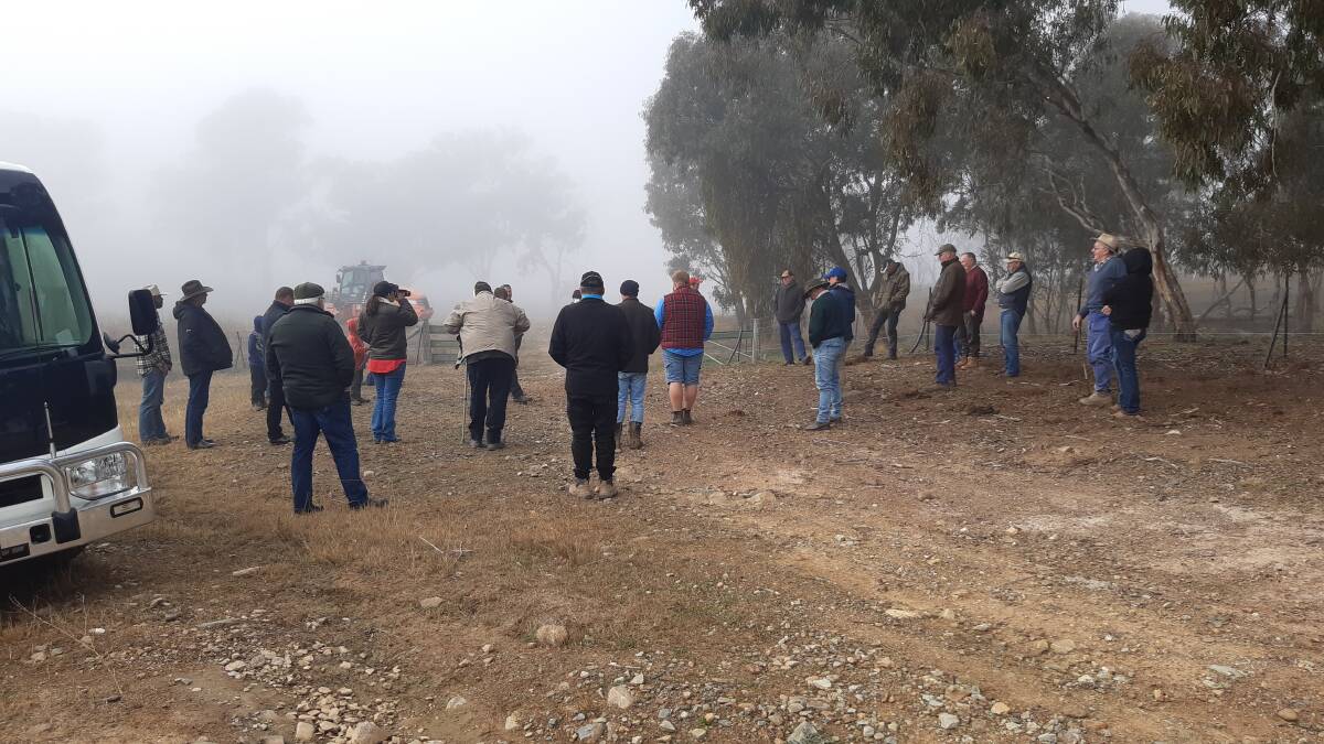 LEARNING EXPERIENCE: Spectators listened intently to farmer Mal Healey at his Box Hill property at a Local Land Services exclusion fencing display.