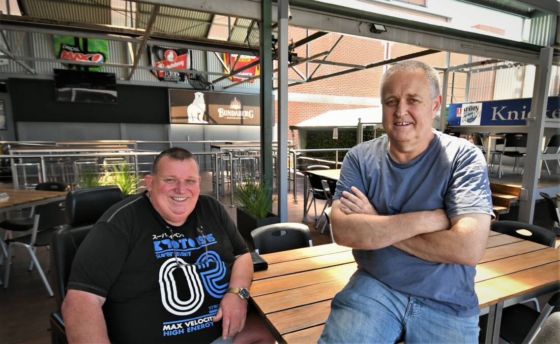 ADAPTING: The Knickerbocker Hotel's Craig Lusby and Scott Maguire out the back of the CBD pub. Photo: CHRIS SEABROOK
