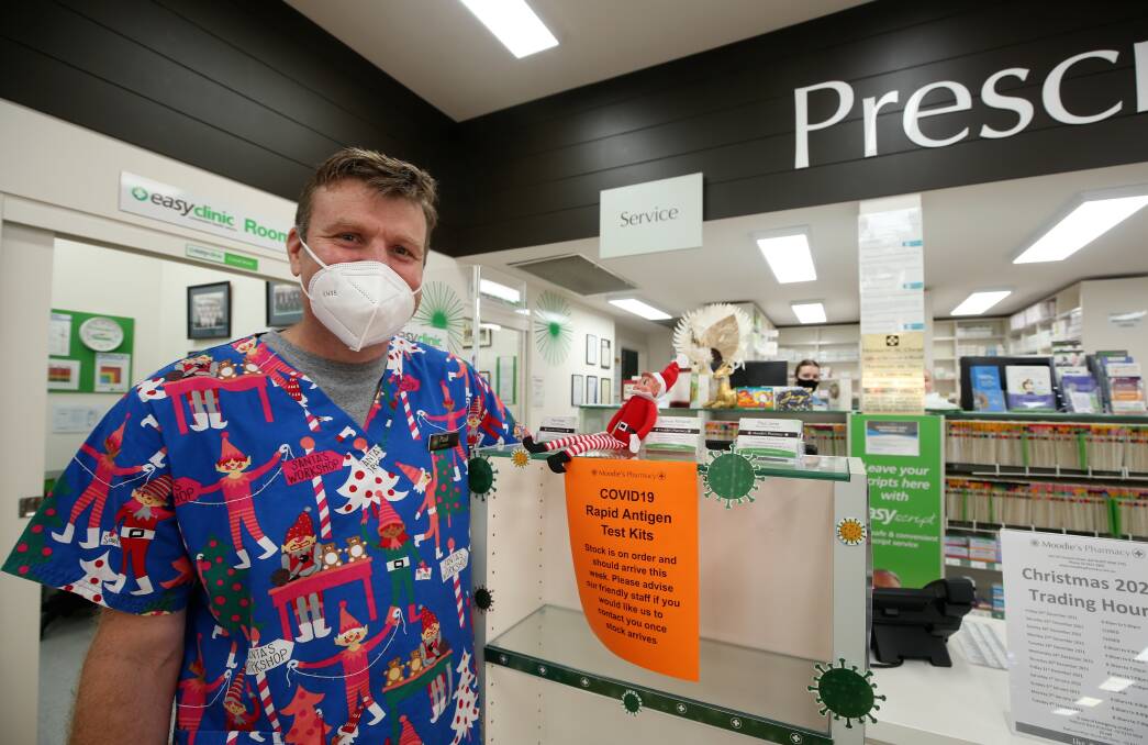 IN DEMAND: Pharmacist and proprietor Paul Jones at Moodie's, where rapid antigen tests have sold out for the moment. Photo: PHIL BLATCH