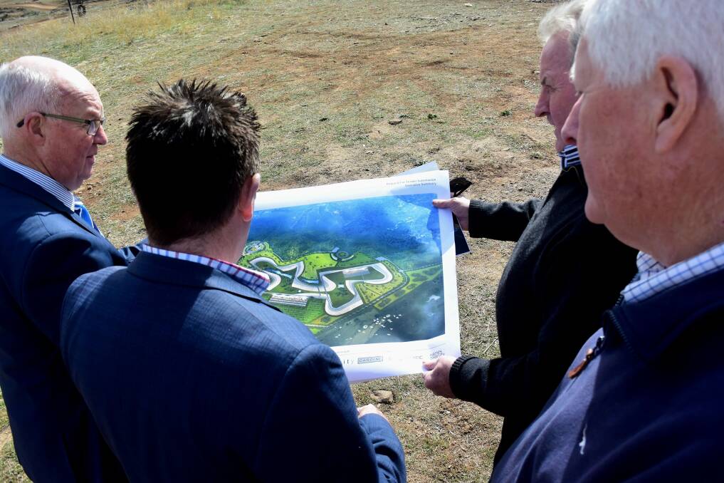 PLAN: Mayor Graeme Hanger, state member Paul Toole, Bruce Morgan and Robert 'Stumpy' Taylor look at the concept design for the proposed second circuit.