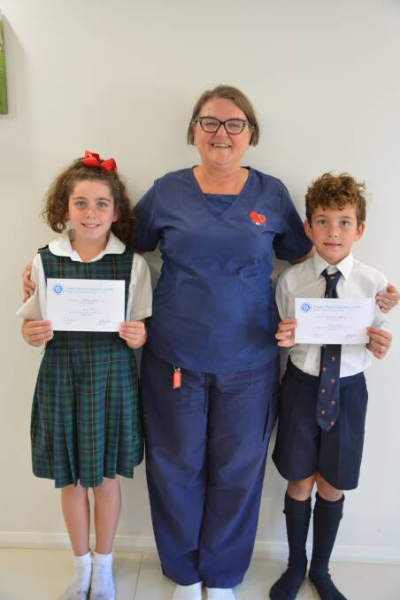 SUPPORT: CWA Bathurst Evening Branch president Sheena Rigby with Ruby and Harry Thorne, who have won Phillips Group scholarships.