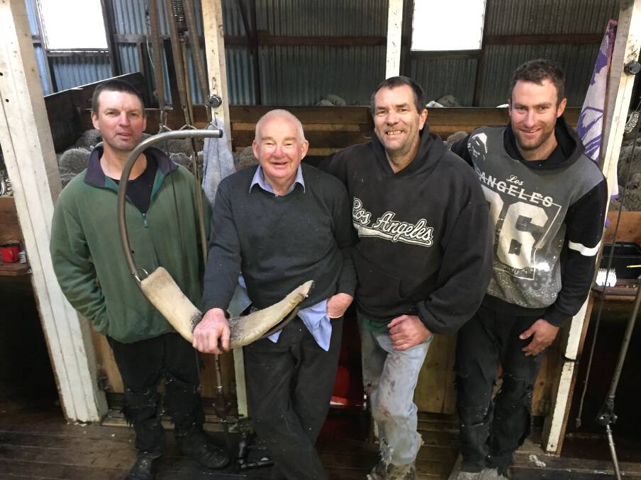 SHEAR SATISFACTION: Gary "Bluey" Stapleton (second from left), who has racked up 50 years shearing in the same shed at Tarana, with Noel Grant, Rowan Charlton and Guy Fletcher.