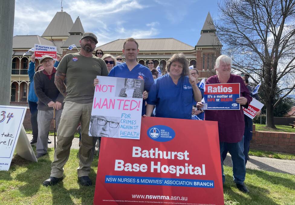 Bathurst branch of the NSW Nurses and Midwives' Association president Kathi Hamilton (second from right) during a rally out the front of the hospital (part of a 24-hour strike) on Thursday morning.