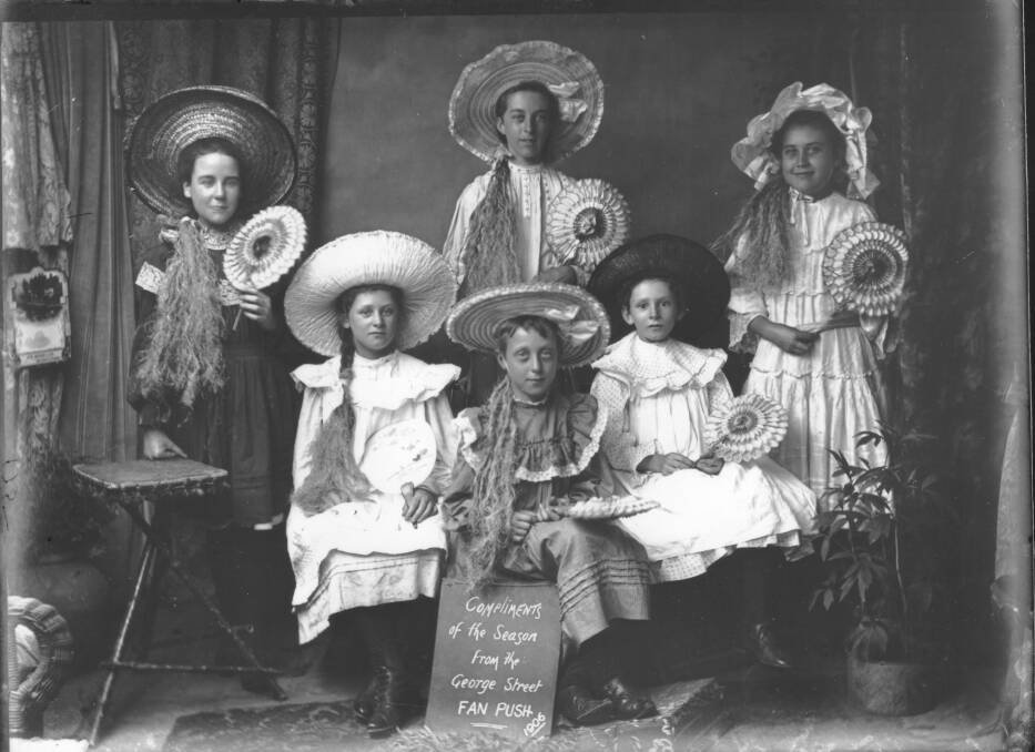 FAN CLUB: Six young ladies from Bathurst pose with decorative fans for Christmas cards in 1906.