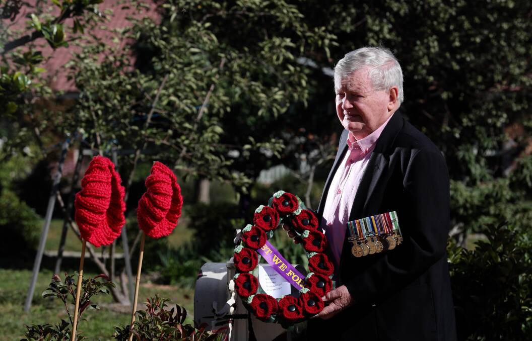 SOLEMN: Bathurst RSL Sub Branch president David Mills during a very different Anzac Day last year. Photo: PHIL BLATCH