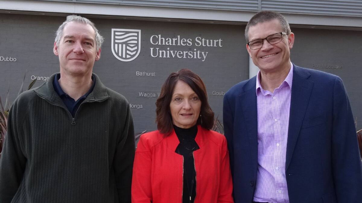 MILESTONE: Anthony Dusselaar, Gina Davis and Charles Sturt vice-chancellor Professor Andrew Vann.