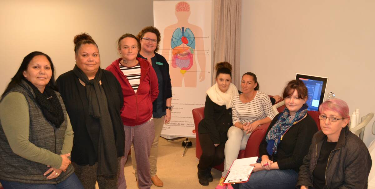 SKILLS: Certificate III in Aboriginal and Torres Strait Islander Primary Health Care students with nursing teacher Kathy Pearce (fourth from left).
