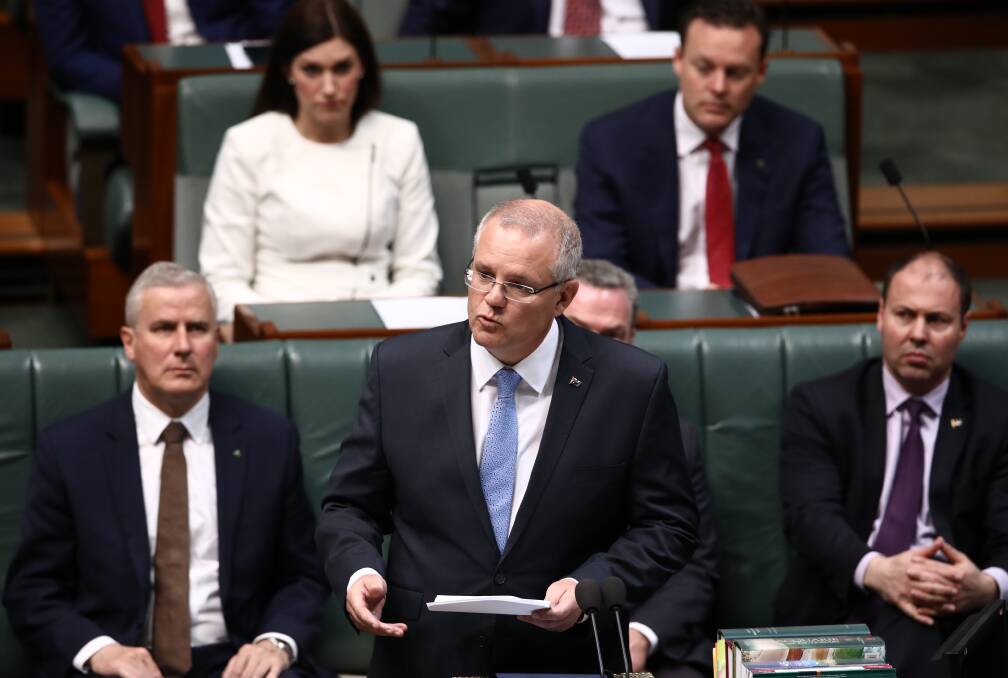 SOMBRE: Prime Minister Scott Morrison delivers his national apology to victims and survivors of institutional child sexual abuse. Photo: DOMINIC LORRIMER