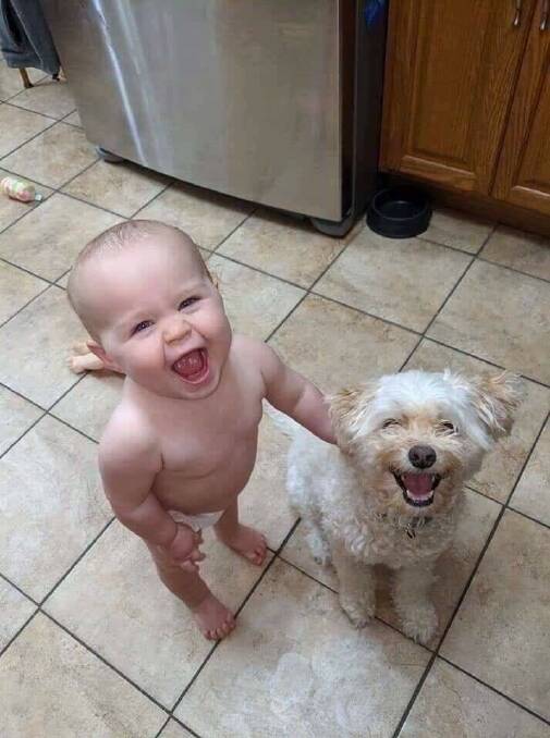 OH BABY: Let's all start the new year with smiles like these two youngsters.