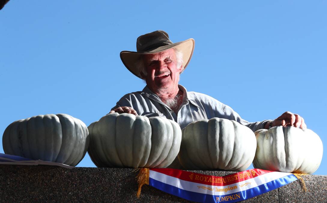 PUMPED: Ray Todd with his prize-winning pumpkins from the Royal Bathurst Show. Photo: PHIL BLATCH 041718pbpump4