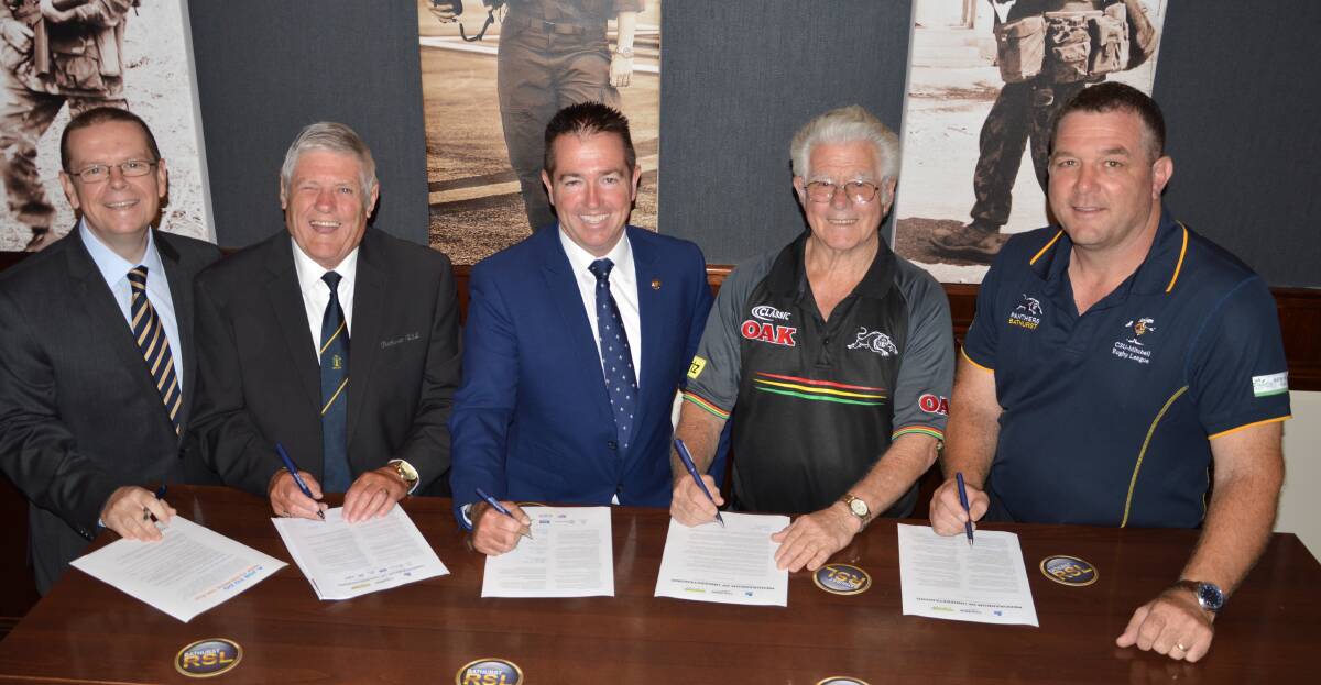 DOTTED LINE: Bathurst RSL Club general manager Peter Sargent and president Ian Miller, Member for Bathurst and Minister for Racing Paul Toole and Norm Mann and John Fearnley from Panthers Bathurst.