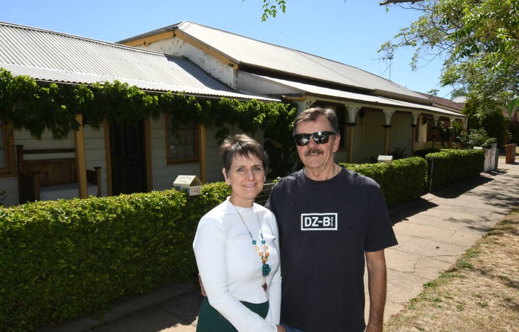 PAST AND PRESENT: Gerarda and Tony Mader at their historic cottages in Keppel Street. Photo: CHRIS SEABROOK 120319csettlers