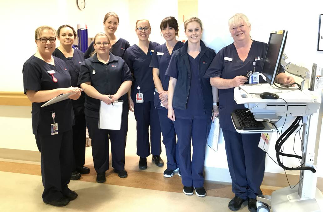 HARD WORK: Surgical ward nursing unit manager Catherine Poschich with members of her team.