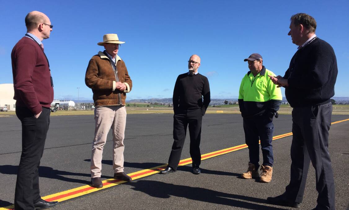 BOOST: Bathurst Regional Council technical services manager Bernard Drum, Member for Calare Andrew Gee, mayor Ian North, airport groundsman Chris Smith and director of engineering services Darren Sturgiss.