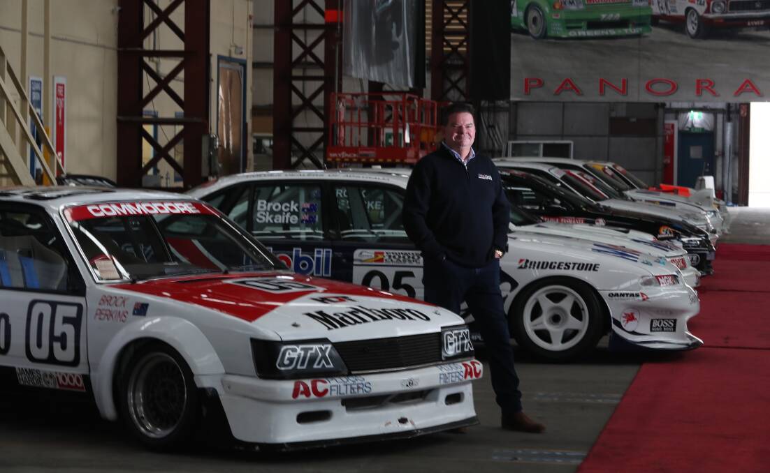 IN DEMAND: Lloyds Auctions head classic car curator Rian Gaffy with the Bathurst-winning Brock car that has reached $1.6 million in online bidding. Photo: PHIL BLATCH 