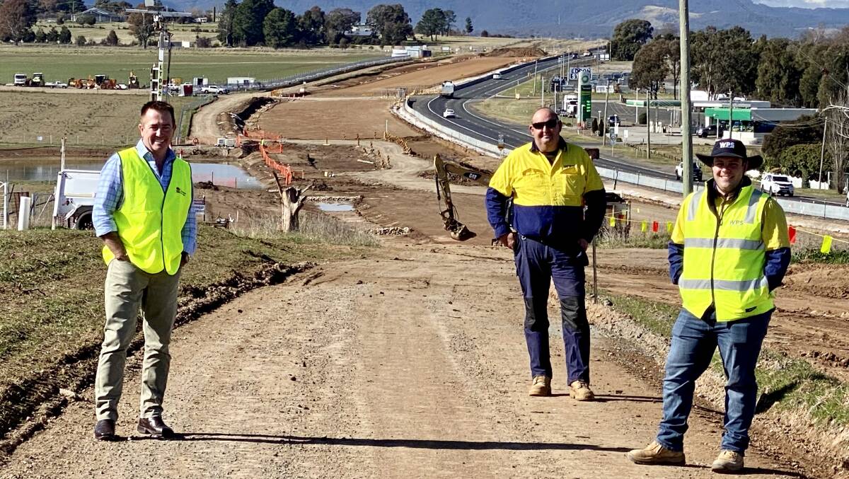 SITE SEEING: Member for Bathurst Paul Toole with Terry James and Luke McDermott at the $45 million highway upgrade at Raglan last month.