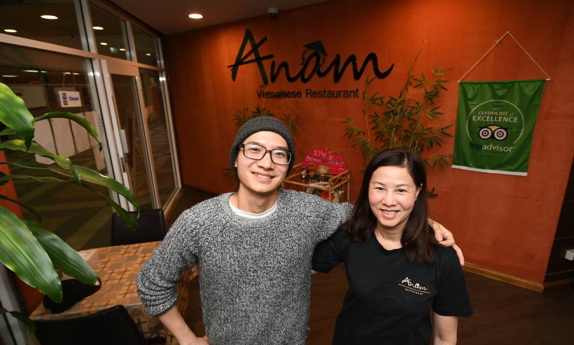 GOOD NEWS: Operations manager Dylan Nguyen and his mother Hue Dao at Anam Vietnamese Restaurant. Photo: CHRIS SEABROOK 092419canam