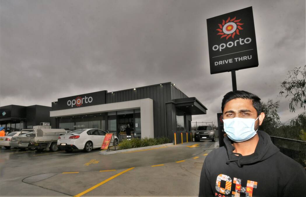Oporto franchise owner Nilesh Patel out the front of the business when it opened at the Gateway site in mid-2021. Picture by Chris Seabrook