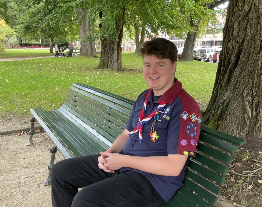 Justin Laver, pictured in Machattie Park, got involved in Scouting as a boy.