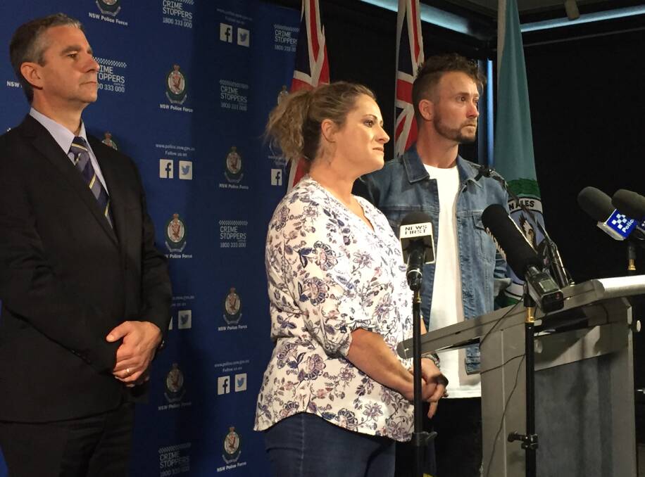 HURT: Homicide Squad Commander, Detective Superintendent Scott Cook, with Janine Vaughan's sister Kylie Spelde and brother Adam Vaughan on Friday.