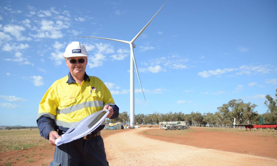 Gavin Paul at the Bodangora Wind Farm in 2018 as its first turbine was assembled. Picture by Elouise Hawkey