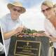Bathurst Family History Group secretary Graeme Hill and travel writer Diana Gleadhill unveil a headstone and plaque for Beatrice Grimshaw (inset) at Bathurst Cemetery in 2017. Photo: CHRIS SEABROOK 011117cgrave1