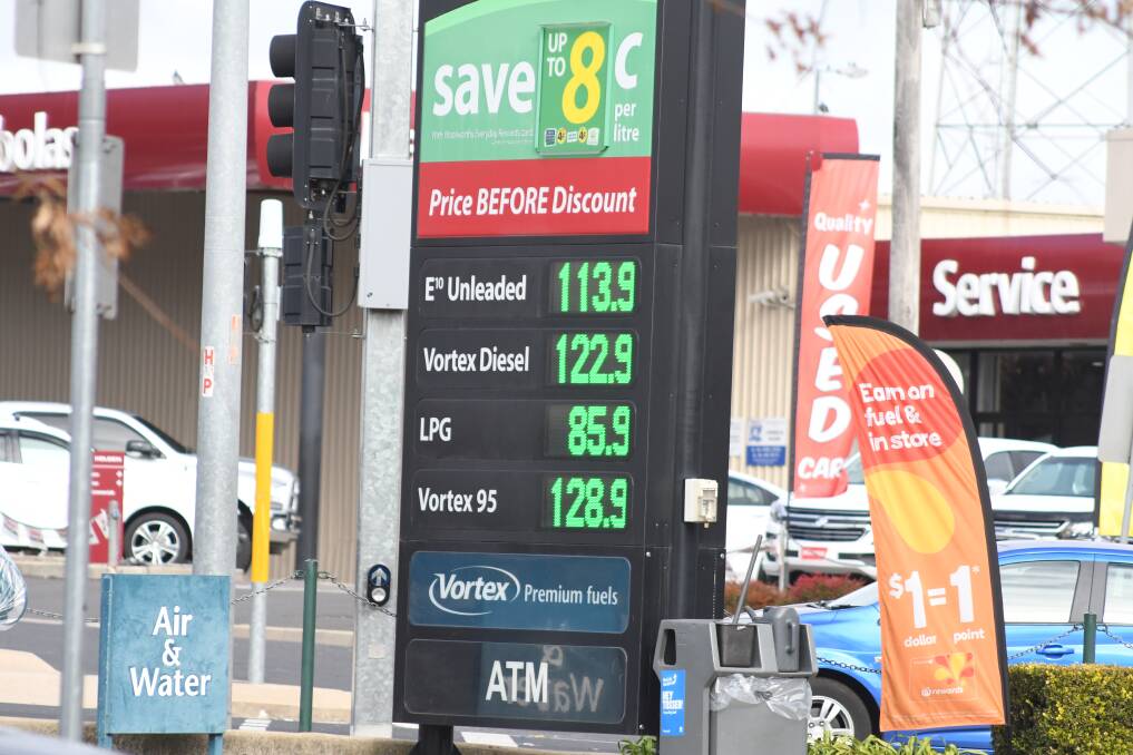 PRICE WAR: This Caltex Woolworths service station has slashed its prices. Photo: JUDE KEOGH