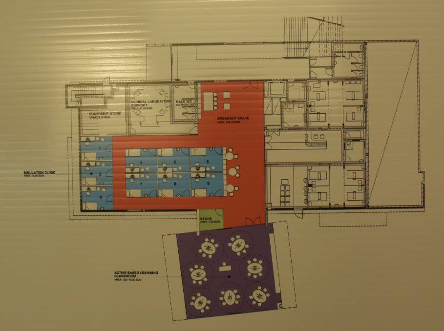 PLAN: An architect's impression of the medical centre with the building extension in purple.