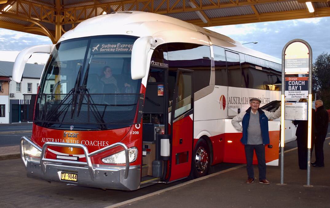 READY TO GO: Orange Rail Action Group chairman Dr Peter Bilenkij at Orange railway station with the first bus. Photo: Supplied